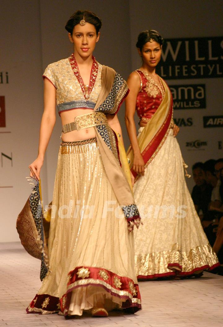 Models showcasing  designer Anju Modi's  creations at the Wills Lifestyle India Fashion Week-Spring summer 2011,in New Delhi on Sunday