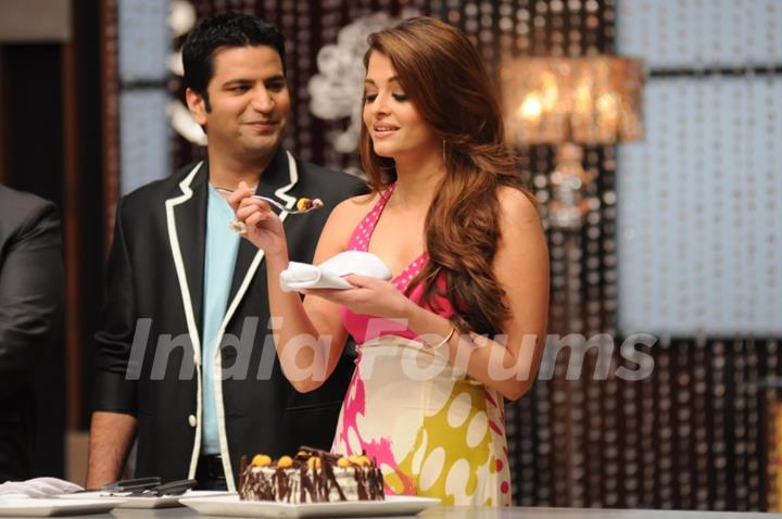 Aishwarya while tasting a special Black forest cake on the sets of Master Chef India