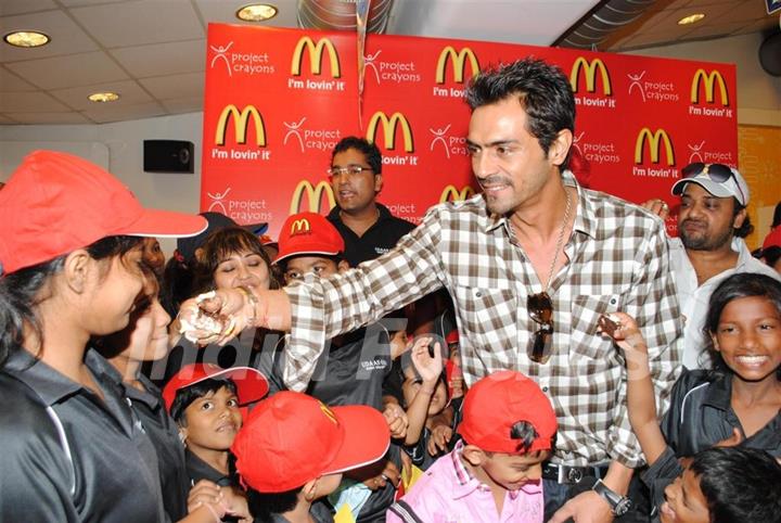 Arjun Rampal & Sajid celebrate Children’s Day with underprivileged kids at McDonalds at Fun Republic in Andheri, Mumbai