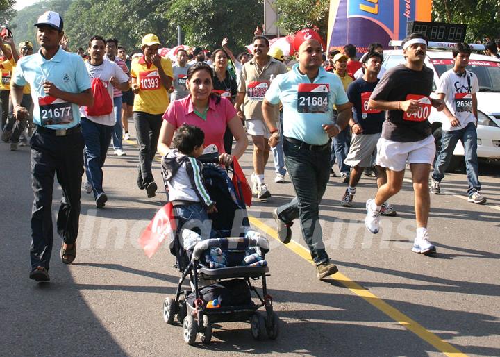 Participants during the Delhi Half Marathon, in New Delhi