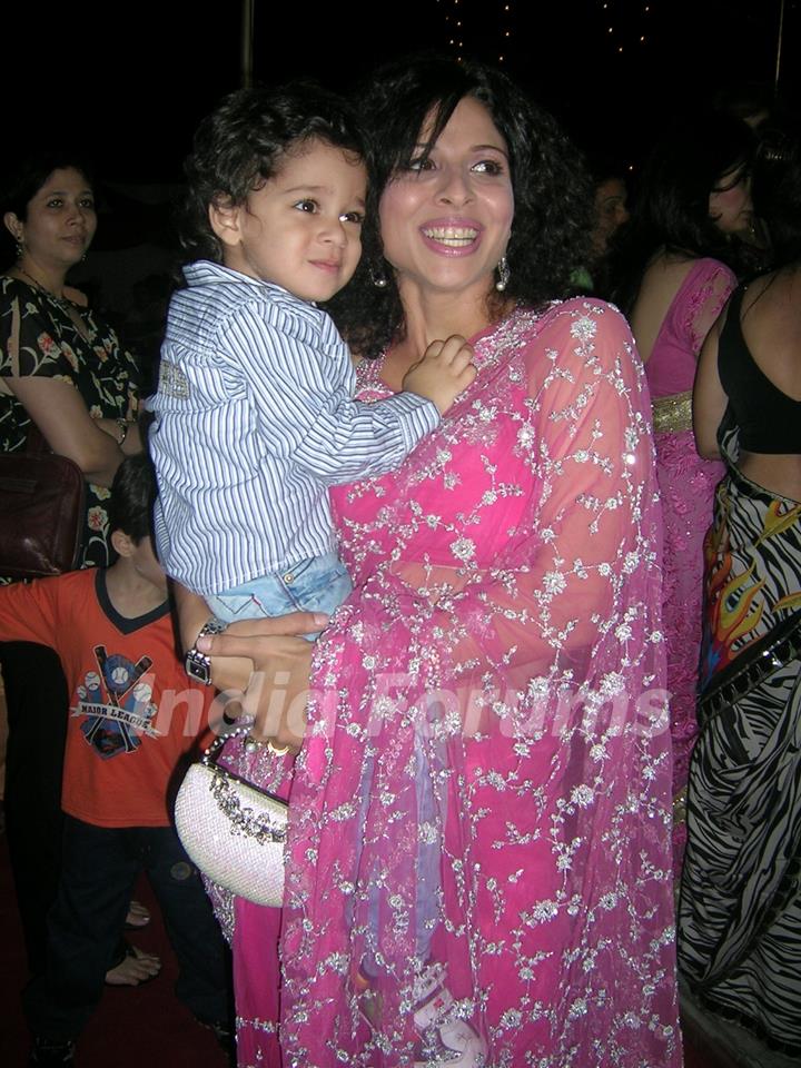 Tanaaz Irani with her new look with her son Zeus in arms