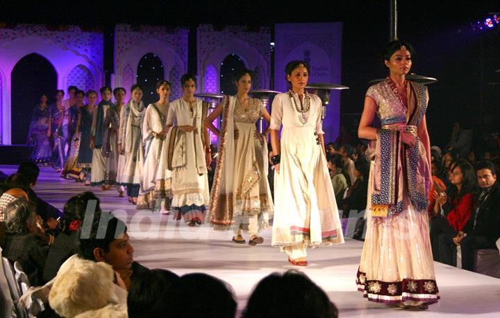 Models showcasing collections by Anju Modi at the National Handloom Expo,in New Delhi on Tuesday. .