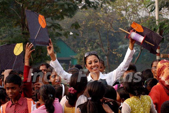 Kolkata: Tollywood actress Paoli Dam celebrates kites festival during the eve of up coming New Year 2011 in kolkata on Friday. .