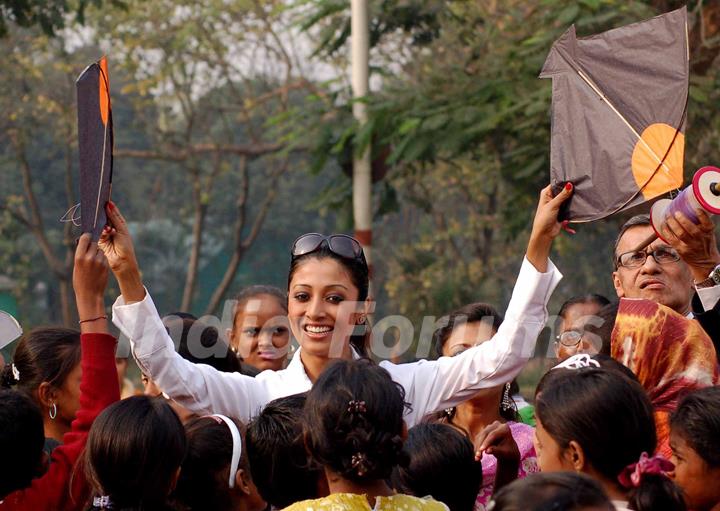 Kolkata: Tollywood actress Paoli Dam celebrates kites festival during the eve of up coming New Year 2011 in kolkata on Friday. .