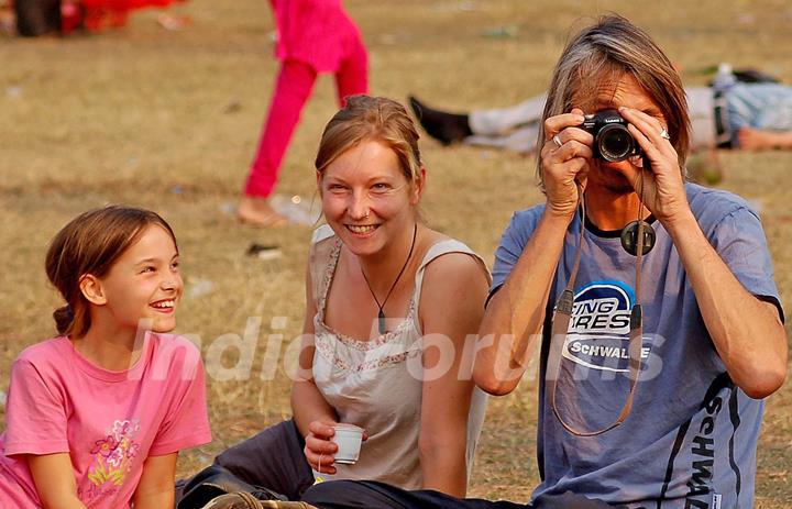 Foreigners capture the moment while tourists enjoy first day of New Year 2011 in Kolkata Maidan on Saturday. .