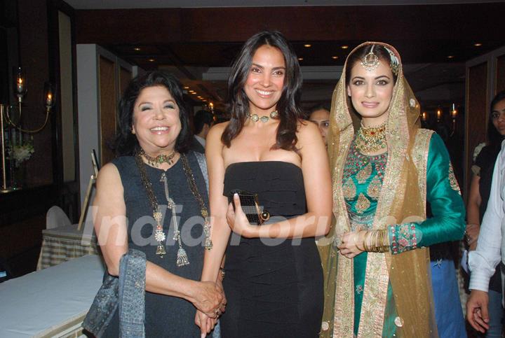 Lara Dutta and Dia Mirza walking on the ramp for Ritu Kumar fashion show at Taj land's End. .