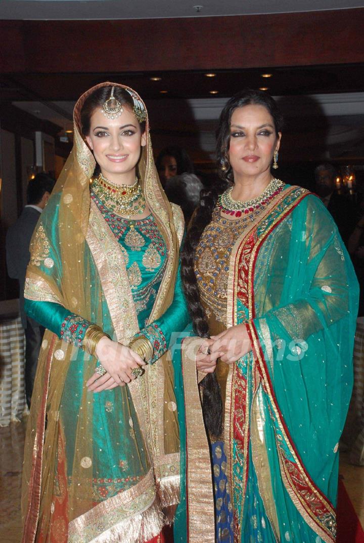 Dia Mirza and Shabana Azmi walking on the ramp for Ritu Kumar fashion show at Taj land's End. .