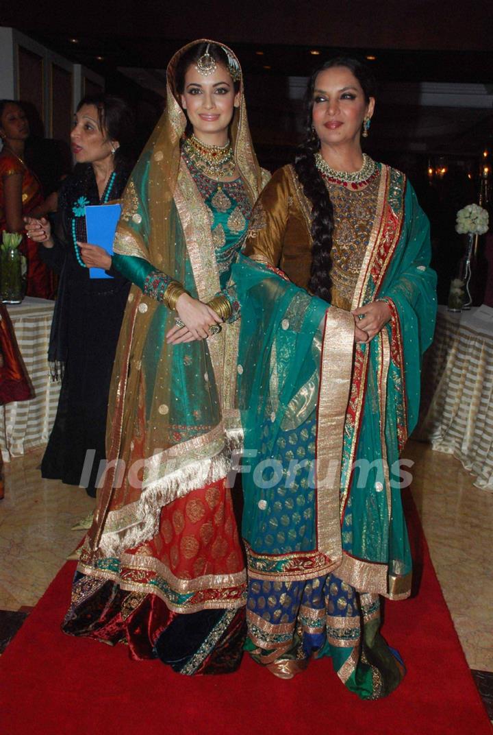 Dia Mirza and Shabana Azmi walking on the ramp for Ritu Kumar fashion show at Taj land's End. .