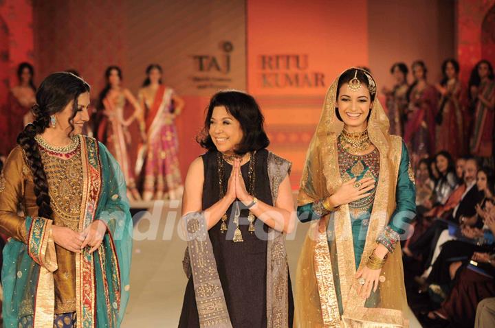 Dia Mirza and Shabana Azmi walking on the ramp for Ritu Kumar fashion show at Taj land's End. .