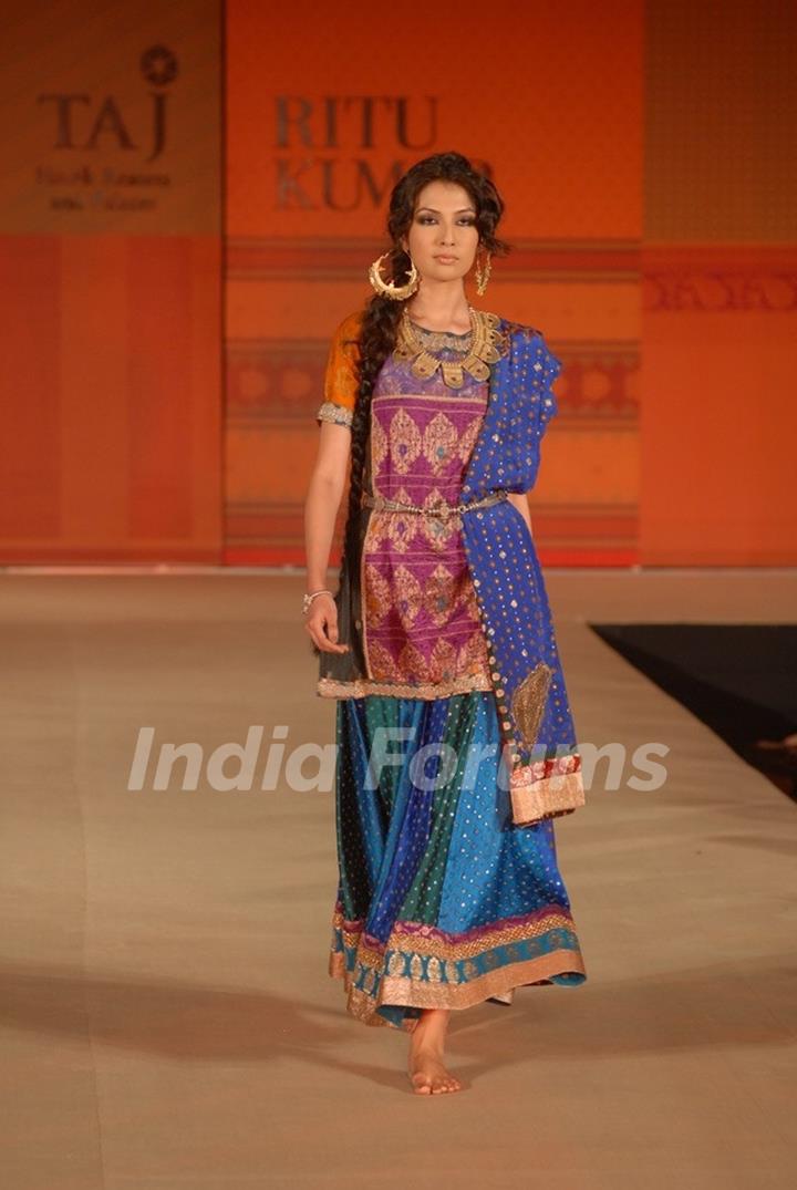 Models walk the ramp for Ritu Kumar fashion show at Taj land's End, Bandra in Mumbai