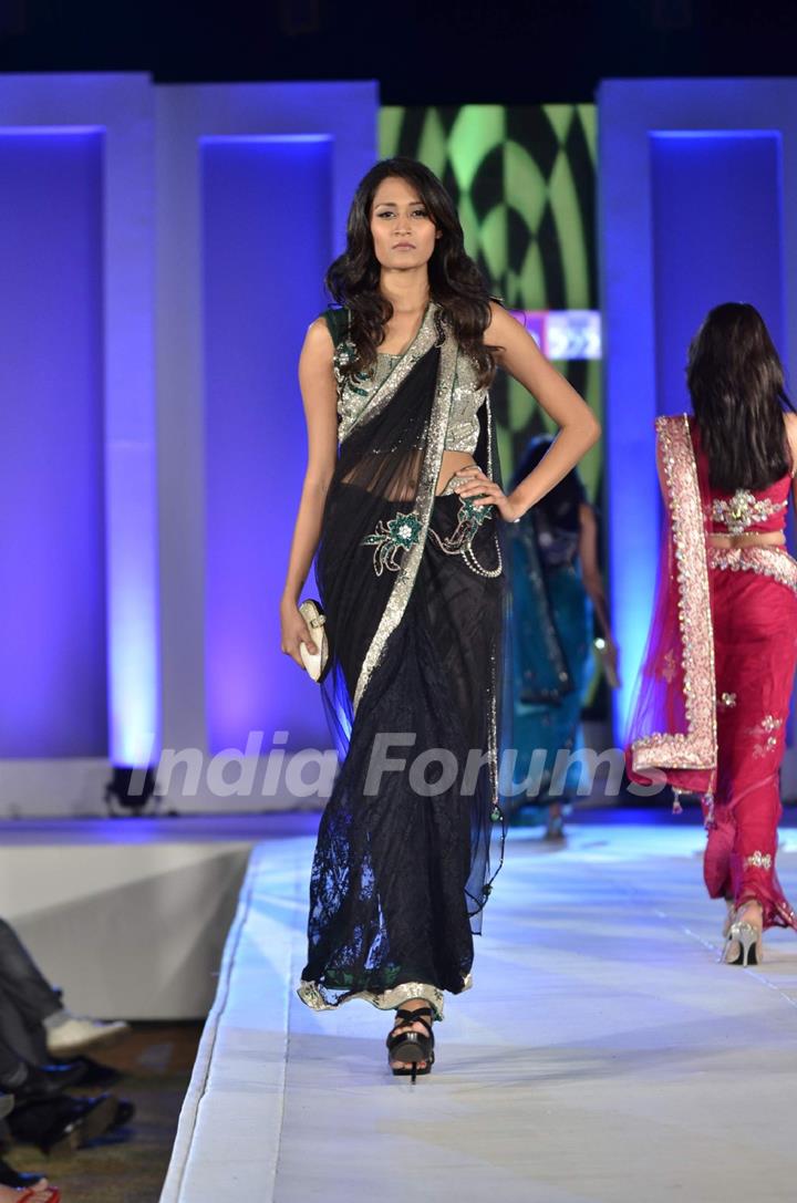 Top Models walk the ramp for Indian and International brands at India Fashion Forum at Renaissance Hotel. .