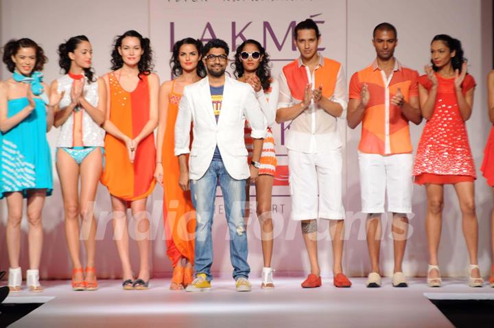 Models displays designer Vivek Karunakaran's creations during the Lakme Fashion Week day 2 in Mumbai. .