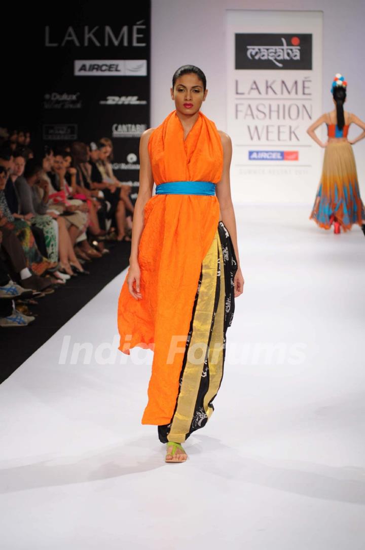 A model walks the runway at the Masaba's show at Lakme Fashion Week day 2 in Mumbai. .