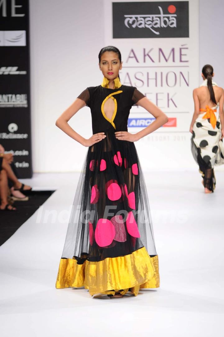 A model walks the runway at the Masaba's show at Lakme Fashion Week day 2 in Mumbai. .