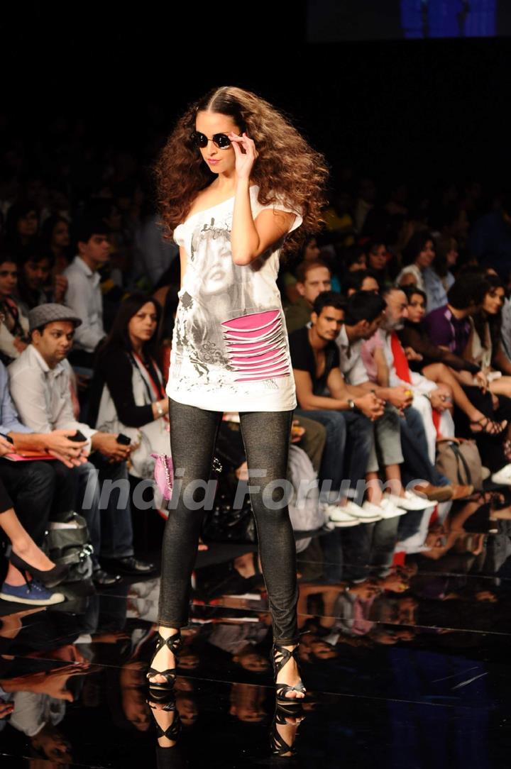 A model displays designer Rocky S's creations during the Lakme Fashion Week day 4 in Mumbai. .