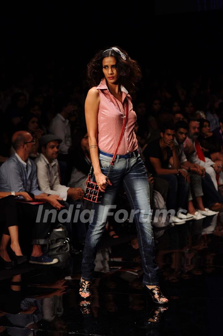 A model displays designer Rocky S's creations during the Lakme Fashion Week day 4 in Mumbai. .