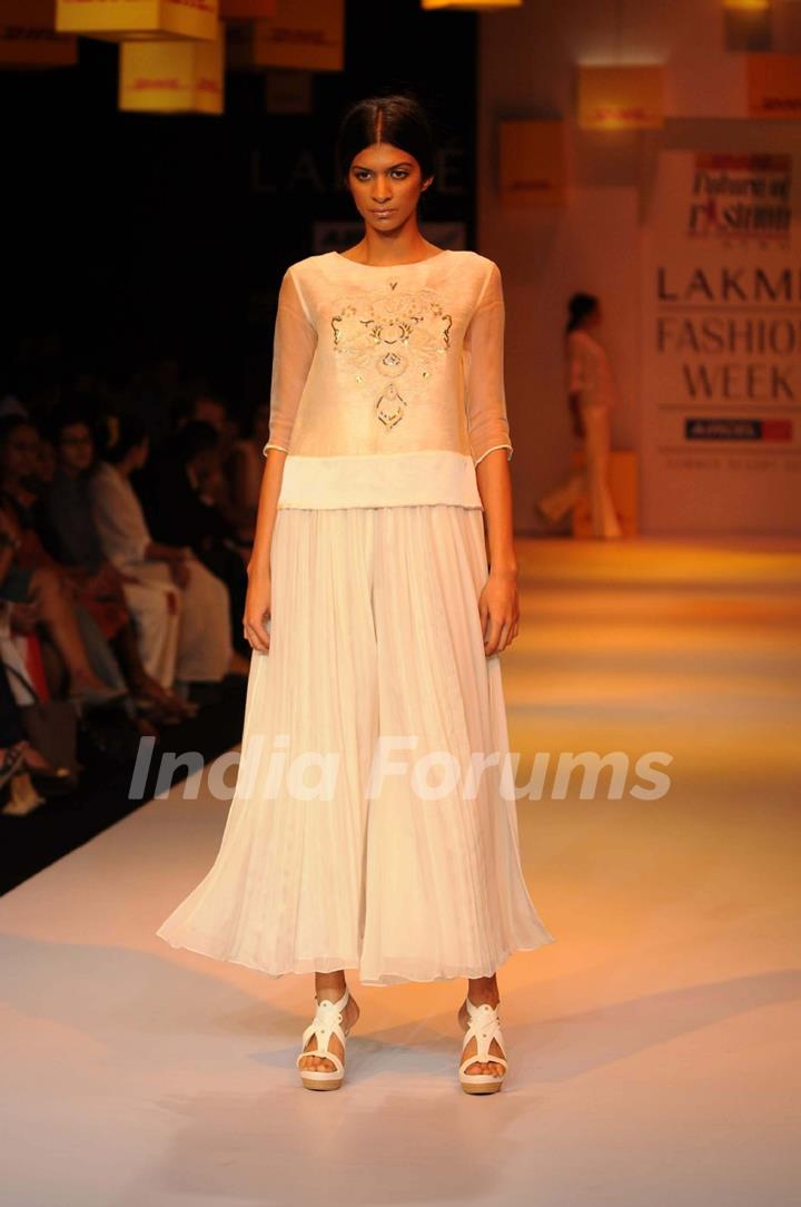 A model displays designer Astu's creations during the Lakme Fashion Week day 4 in Mumbai. .