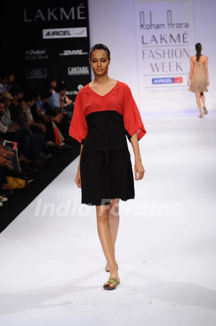 A model displays designer Rohan Arora's creations during the Lakme Fashion Week 2011 Day 5 in Grand Hyatt, Mumbai. .