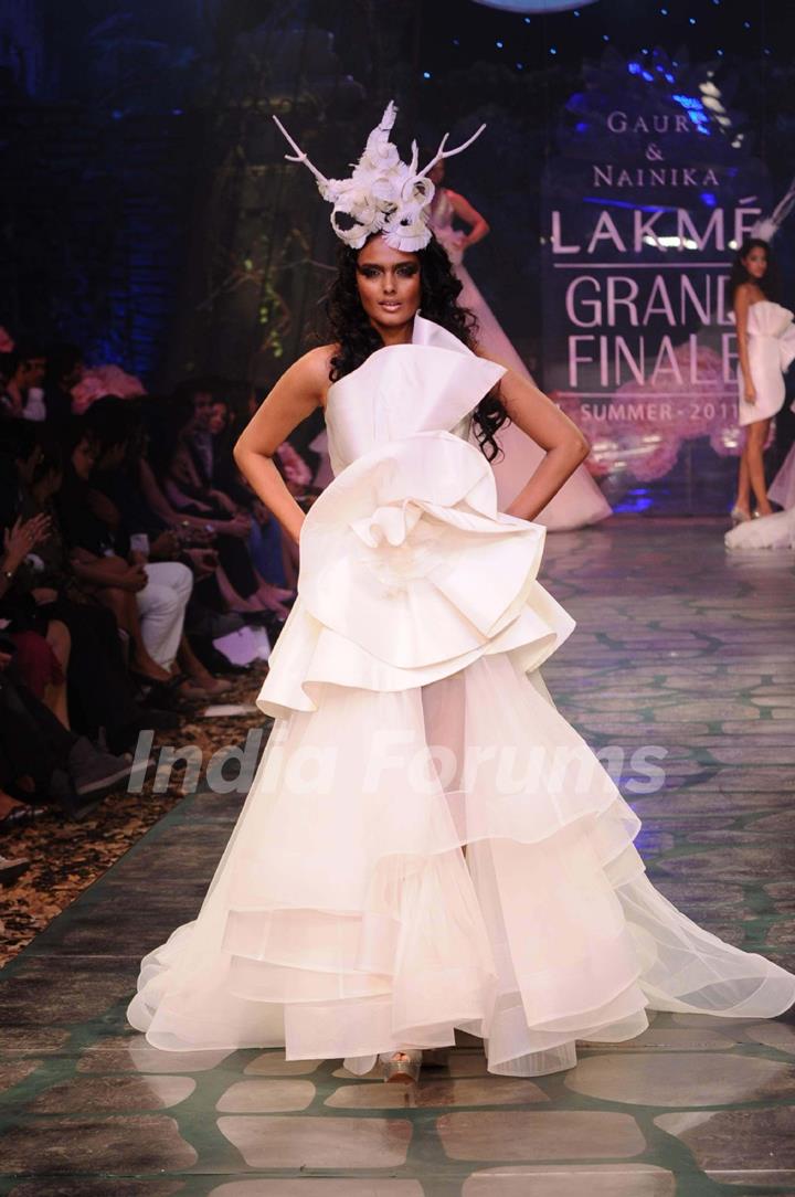 A model displays designer Gauri & Nainika's creations during the Lakme Fashion Week 2011 Day 5 in Grand Hyatt, Mumbai. .