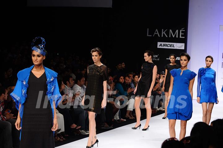 Models display designer Harangad Singh's creation during the Lakme Fashion Week 2011 Day 5 in Grand Hyatt, Mumbai. .