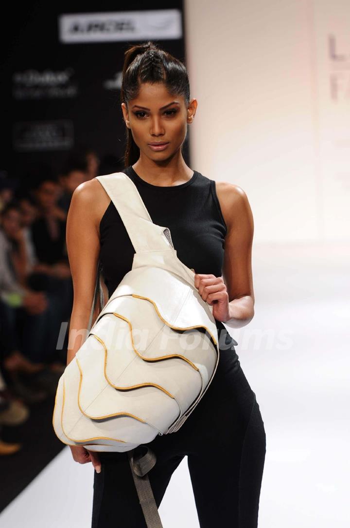 A model displays designer Prabhat kumar's creations during the Lakme Fashion Week 2011 Day 5 in Grand Hyatt, Mumbai. .