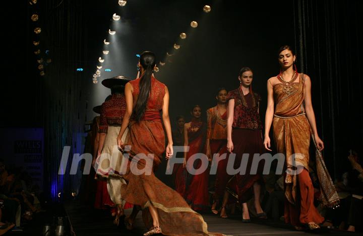 Models showcasing designer Tarun Tahiliani's creations at the Wills Lifestyle India Fashion Week autumn winter 2011,in New Delhi on Wednesday. .