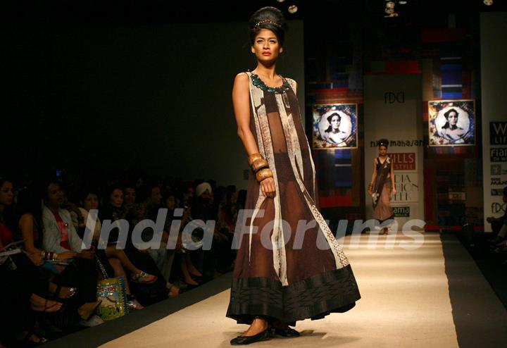 A model showcasing designer Niki Mahajan's creation at the Wills Lifestyle India Fashion Week autumn winter 2011,in New Delhi on Saturday 9 April 2011. .