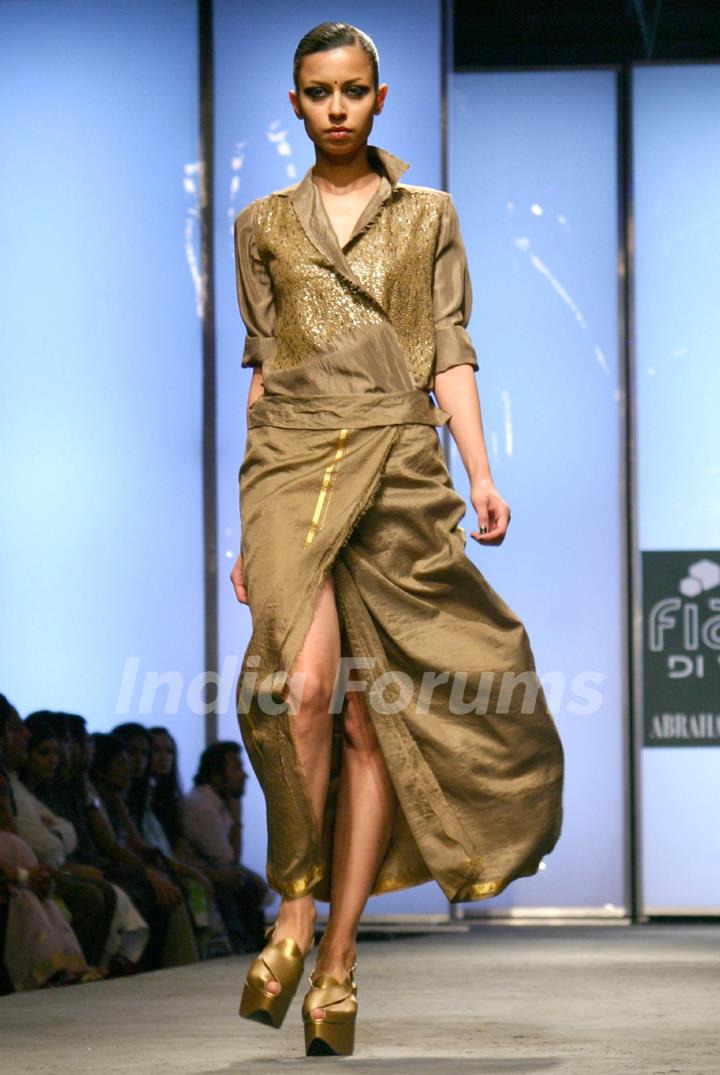 A model showcasing designer Abraham & Thakore's creation at the Wills Lifestyle India Fashion Week autumn winter 2011 in New Delhi on Saturday 9 April 2011. .