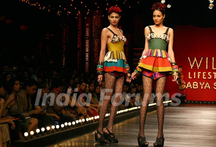 Models showcasing designer Sabyasachi's creations at the Wills Lifestyle India Fashion Week's Grand Finale ,in New Delhi on Sunday. .