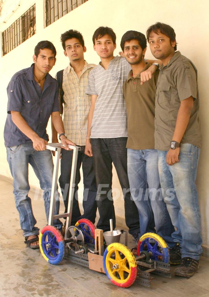 A IIT Delhi students with their innovated low cost Seed Sower at the Open House 2011 in New Delhi on Saturday. .