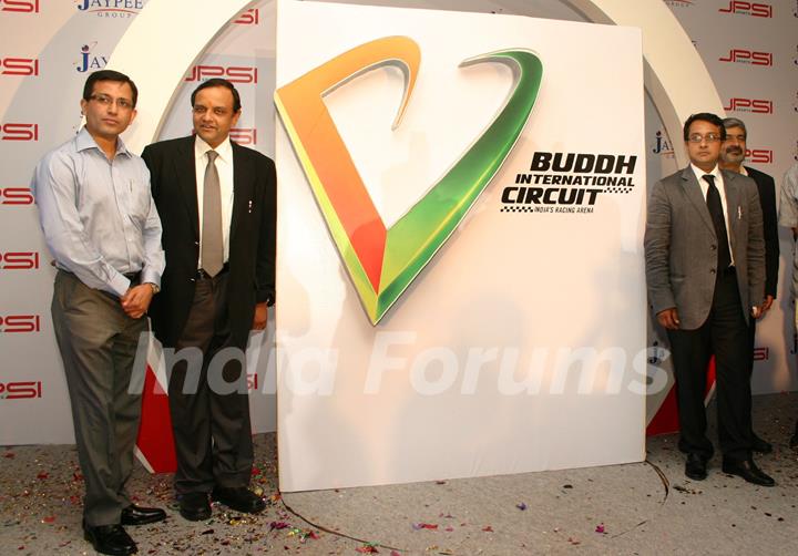 (L to R) Jaypee Group's JPSK Sports  MD Smeer Gaur,Chairman  Mukesh Gaur and Vicky Chandhok at the unveiling of 'Buddh International Circuit' (Formula-1 race Circuit) Logo, at Greater Noida on Monday. .