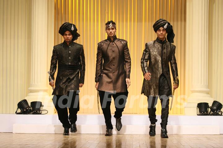 Models walk the ramp at Silhousettes 2011 Vintage Vogue Fashion show by B. D. Somai Institute of Art