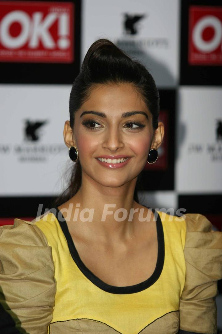 Sonam Kapoor shows off the OK magazine cover at its launch event held at Enigma in Mumbai