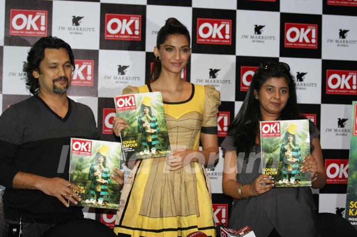 Sonam Kapoor shows off the OK magazine cover at its launch event held at Enigma in Mumbai