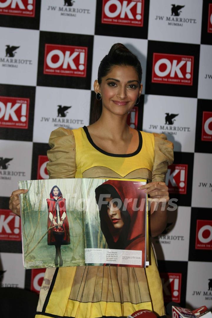 Sonam Kapoor shows off the OK magazine cover at its launch event held at Enigma in Mumbai