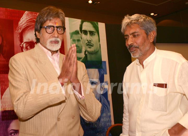 Film 'Aarakshan' director Prakash Jha with Amitabh Bachchan at a promotional event for his film