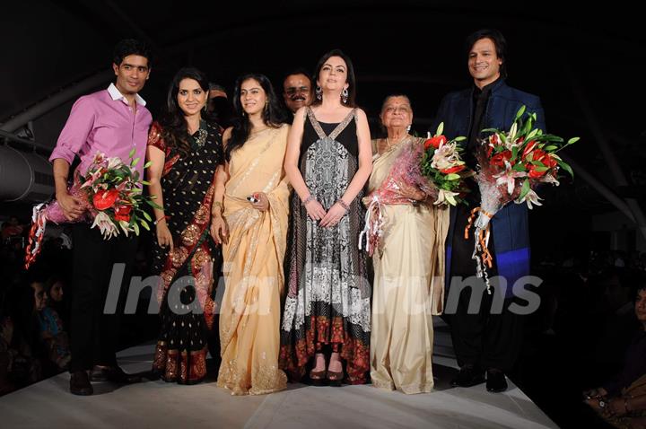 Nita Ambani, Kajol and Vivek Oberoi walk the ramp for Shaina NC and Manish Malhotra at the Pidilite-CPAA charity fashion show