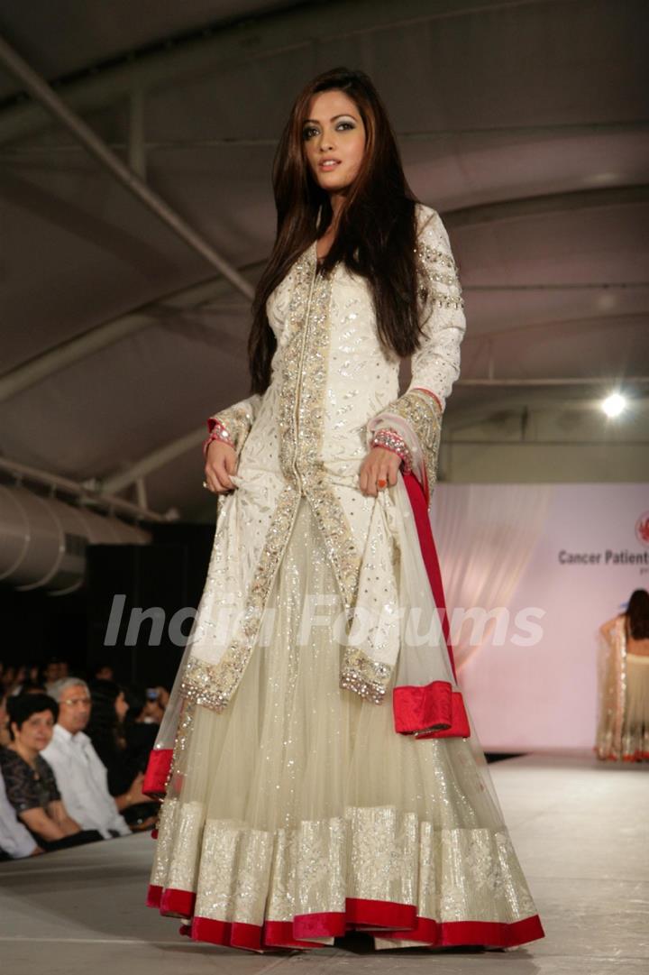 Riya Sen walk the ramp for Shaina NC and Manish Malhotra at the Pidilite-CPAA charity fashion show