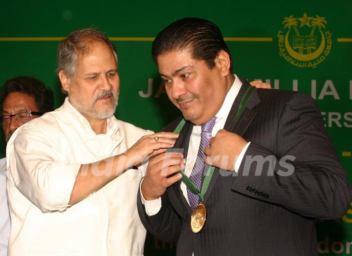 Jamia Millia Islamia's Vice-Chancellor Najeeb Jang conferring the title ''Nishan-e-Azad'' to Ambassador of Saudi Arabia Faisal Hasan Trad at a special ceremony,in New Delhi