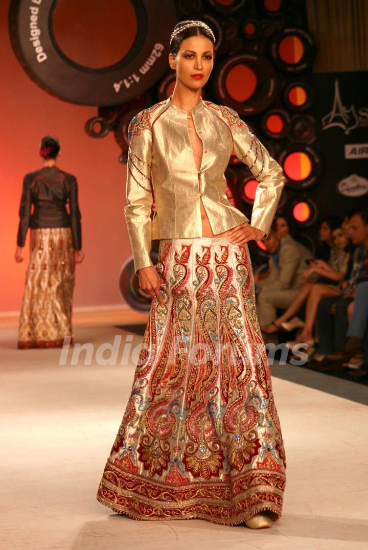 Model showcasing designer J J Valaya's creation at the Synergy one Delhi Couture Week,in New Delhi