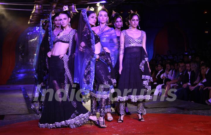 Models showcasing designer Suneet Verma's creations at the Synergy1 Delhi Couture Week,in New Delhi