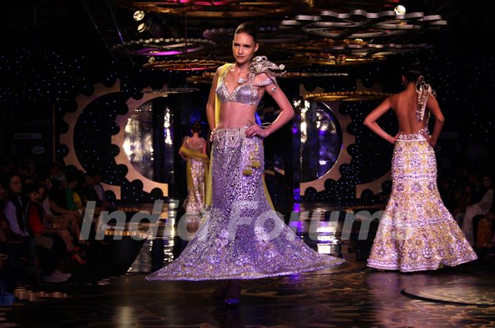 Models showcasing designer Suneet Verma's creations at the Synergy1 Delhi Couture Week,in New Delhi