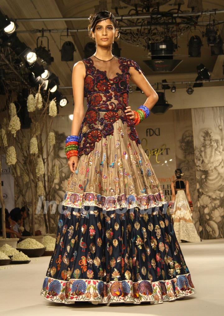 A model showcasing designer Rohit Bal's creation at the Synergy1 Delhi Couture Week,in New Delhi