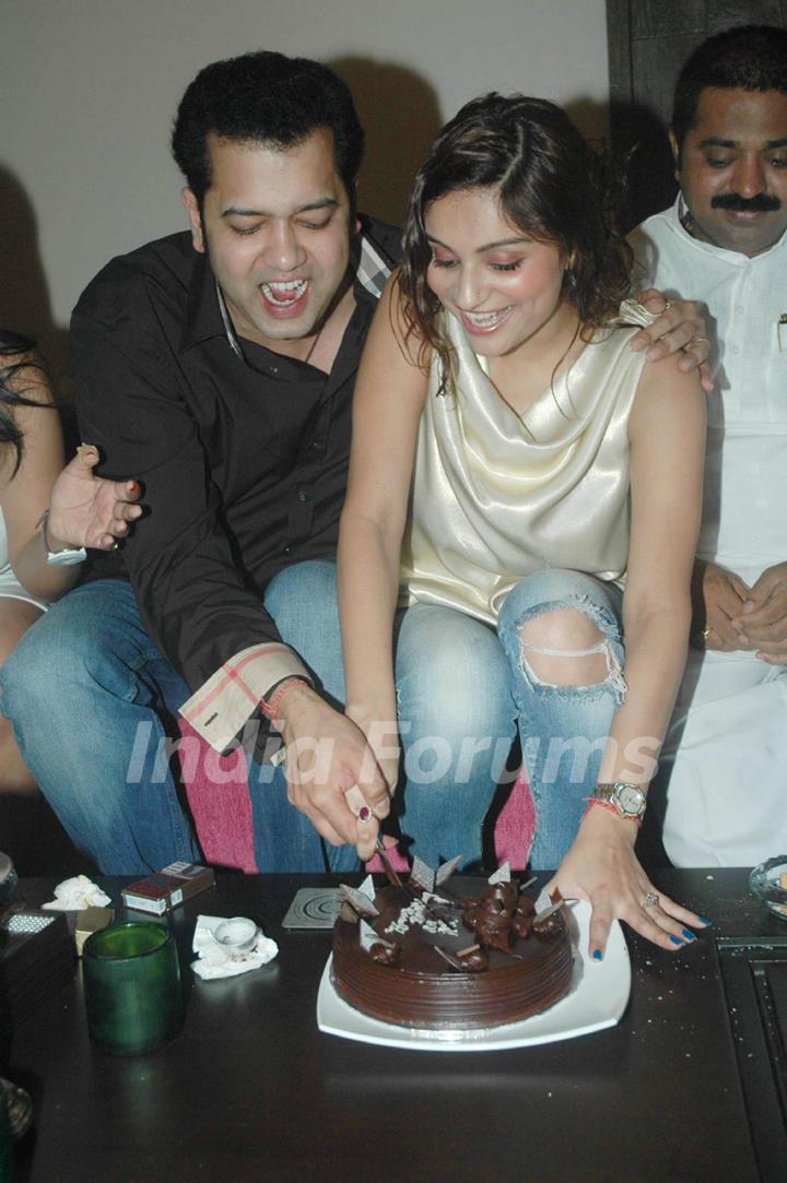 Rahul Mahajan cutting cake with wife Dimpy on his Birthday