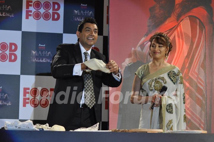 Sanjeev Kapoor with Madhuri Dixit during the announcement of 'Amul FoodFood Mahachallenge' Reality Show in Mumbai