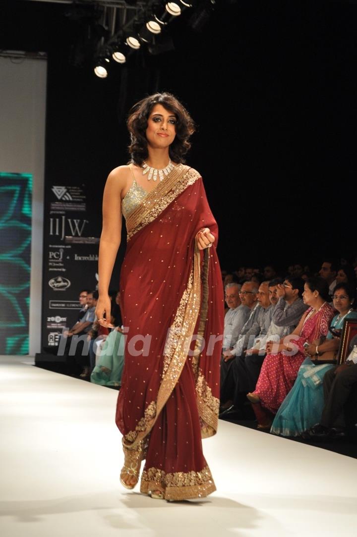 Mahi Gill walk the ramp for Pria Kataria Puri at the IIJW 2011 at Grand Hyatt in Kalina, Mumbai