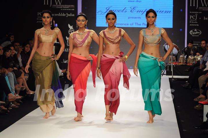 Models walk on the ramp for Jewels Emporium at IIJW 2011 show day 3. .