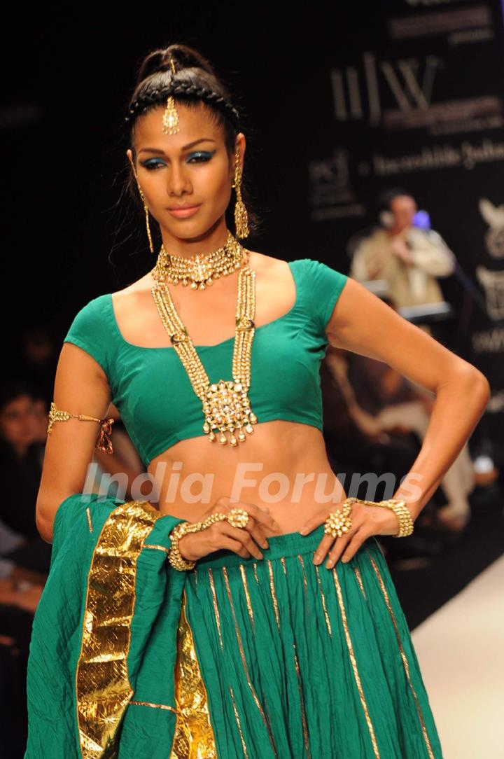 Models walk on the ramp for Jewels Emporium at IIJW 2011 show day 3. .