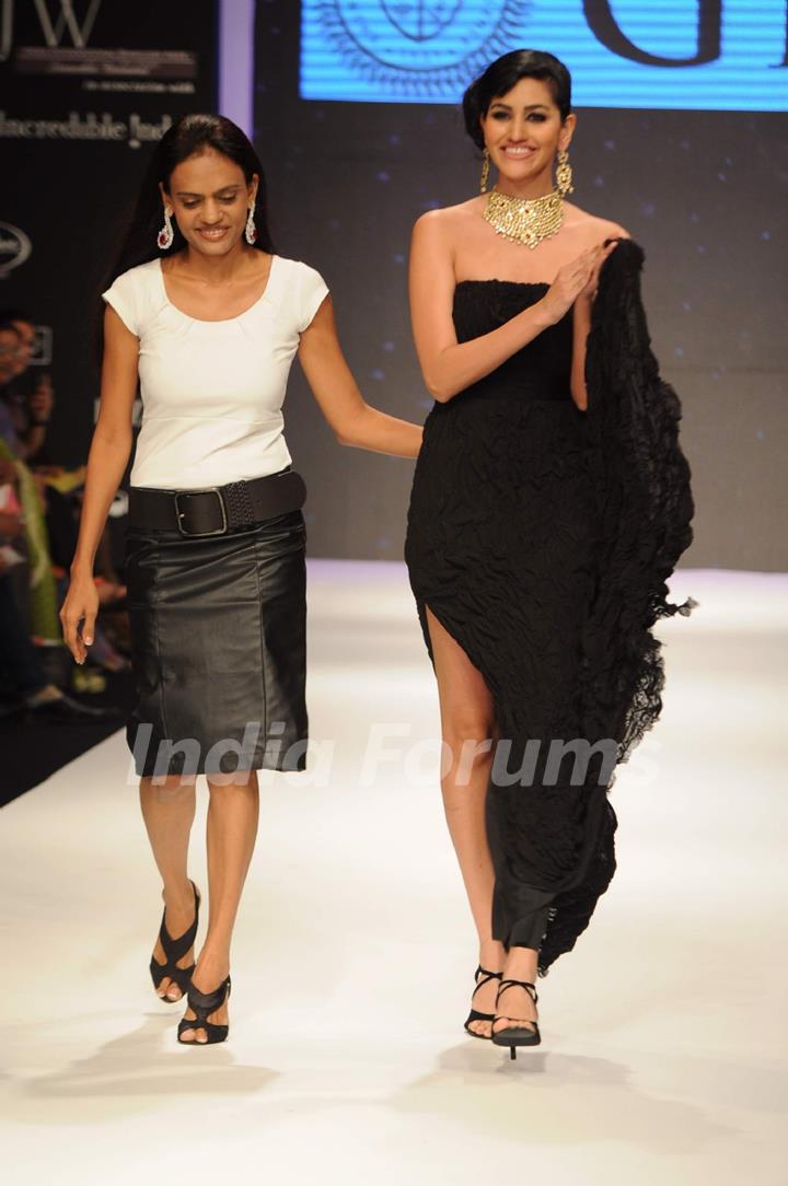 Models walk on the ramp for Dwarkadas Chandumal Diamonds at IIJW 2011 show day 3. .