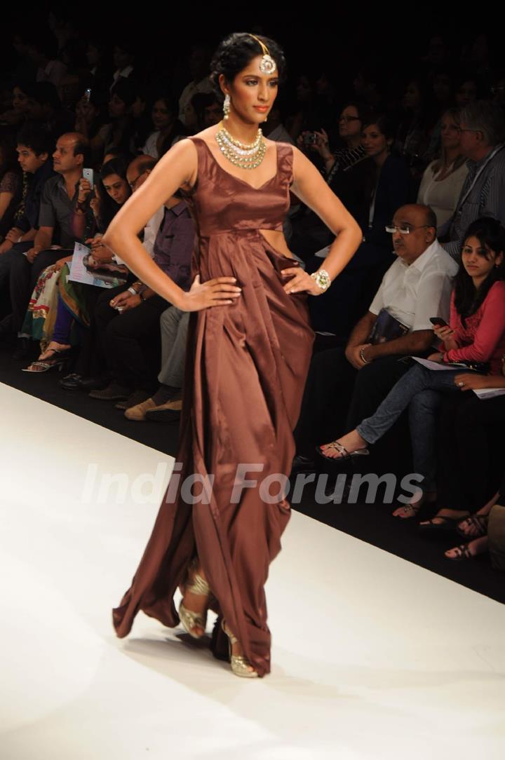 Models walk on the ramp for Dipti Amisha at IIJW 2011 show day 3. .